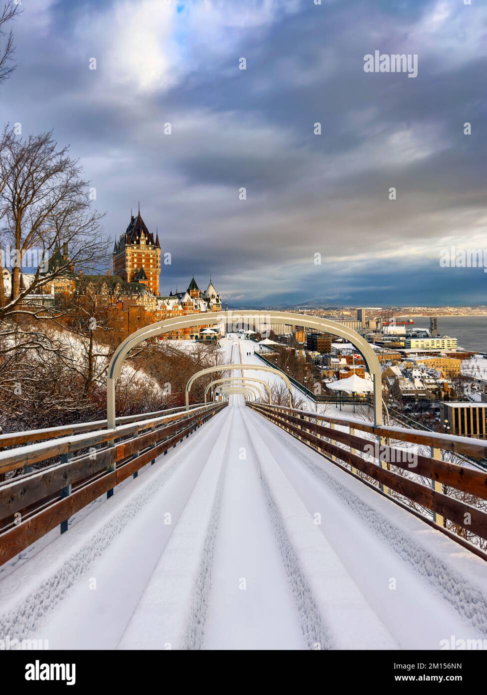 Terrasse Dufferin Slides with snow and Hotel Chateau Frontenac Old