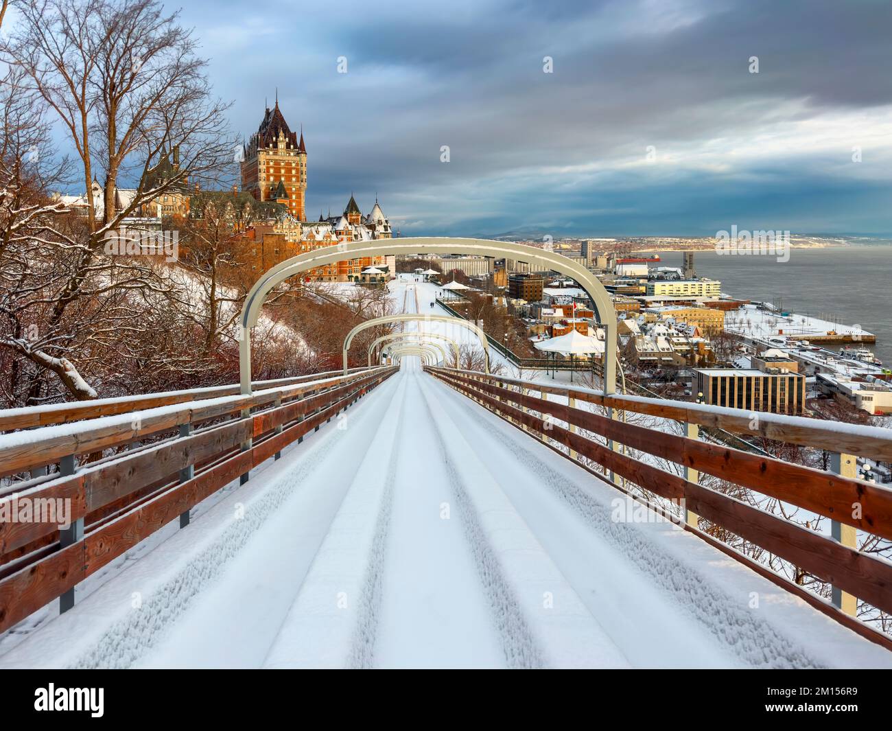 Terrasse Dufferin Slides with snow and Hotel Chateau Frontenac Old