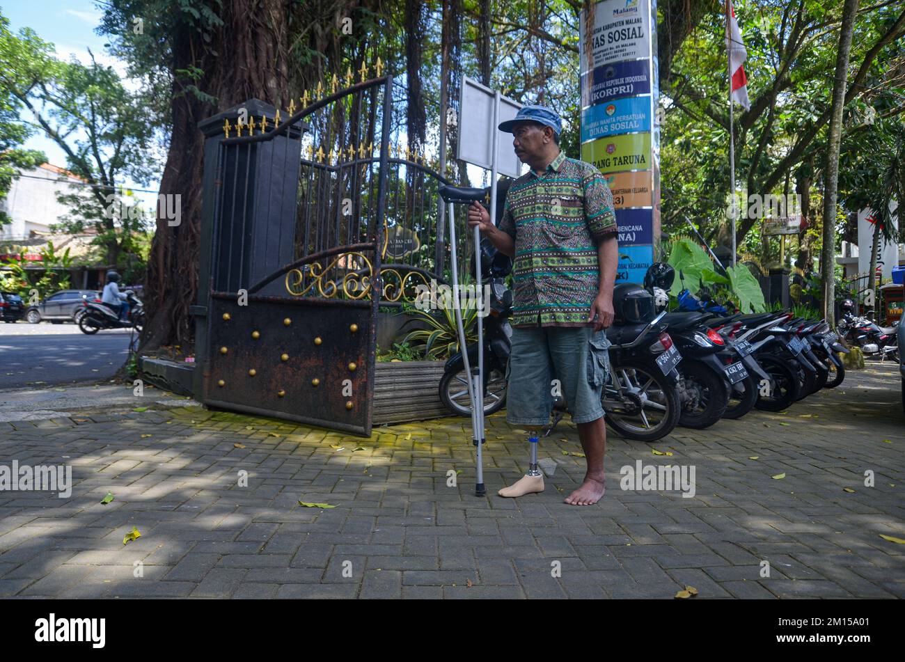 Malang, East Java, Indonesia. 10th Dec, 2022. One person with ...