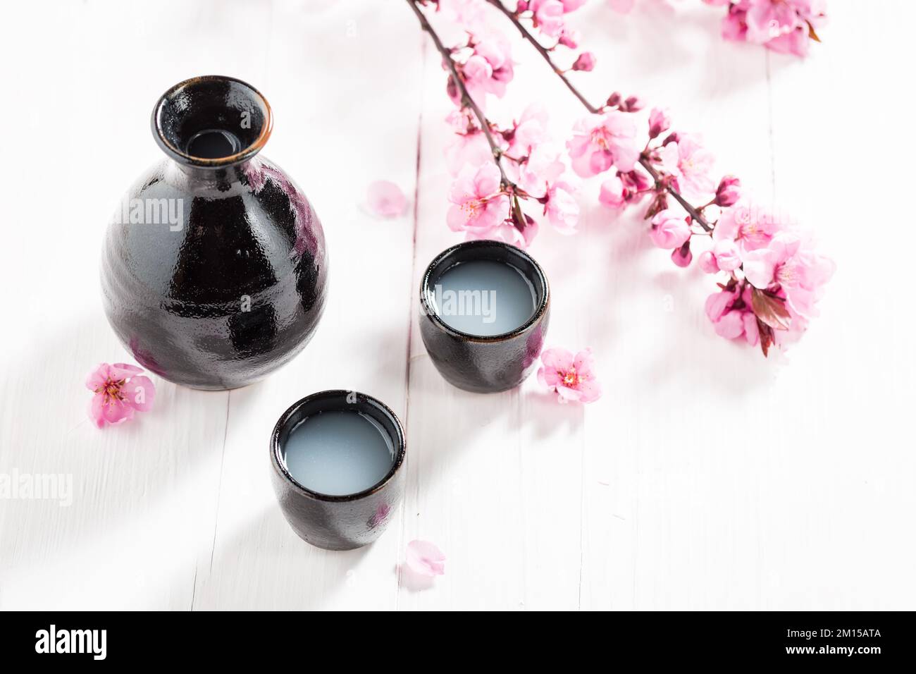 Traditional Japanese sake in small black ceramics. Traditional high