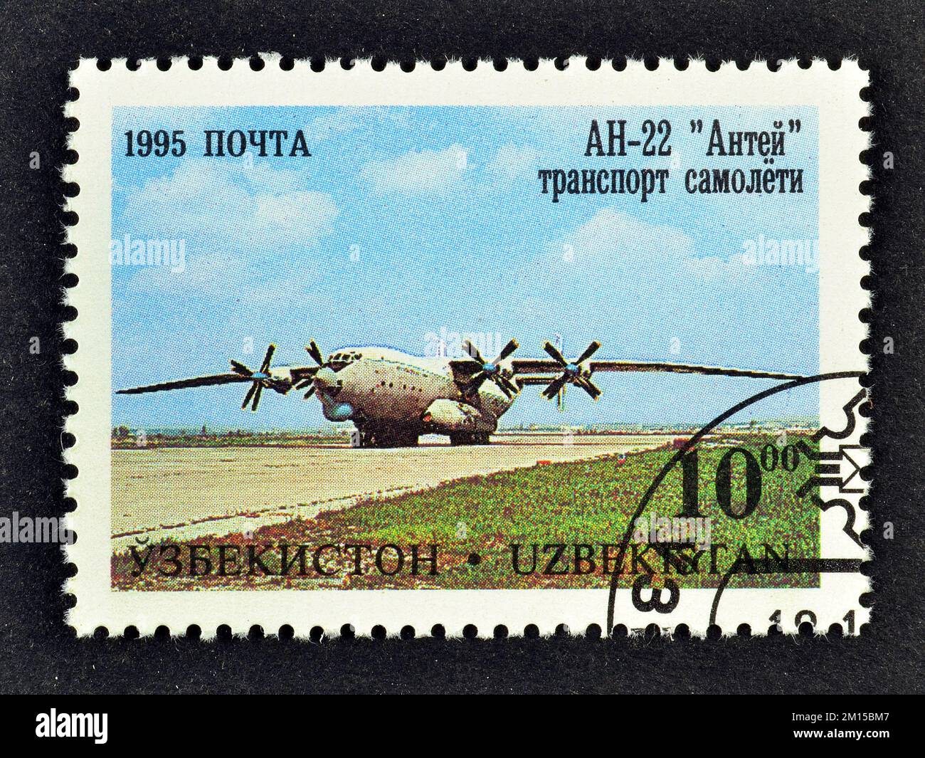 Cancelled postage stamp printed by uzbekistan, that shows Antonov An-22 'Antei' Transport, Aircraft of Tashkent's (V.P. Chkalov) Aircraft Factory, cir Stock Photo