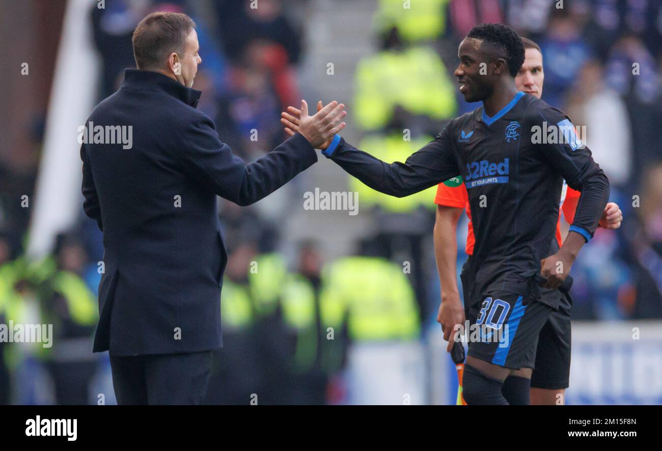 Rangers manager Michael Beale (left) shakes the hand of Rangers Fashion ...