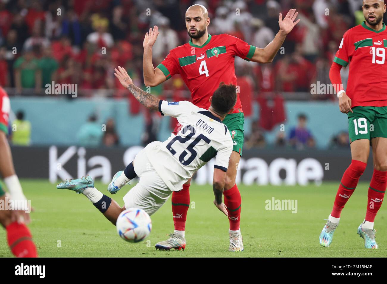 Doha, Qatar. 10th Dec, 2022. Otavio (front) of Portugal vies with ...