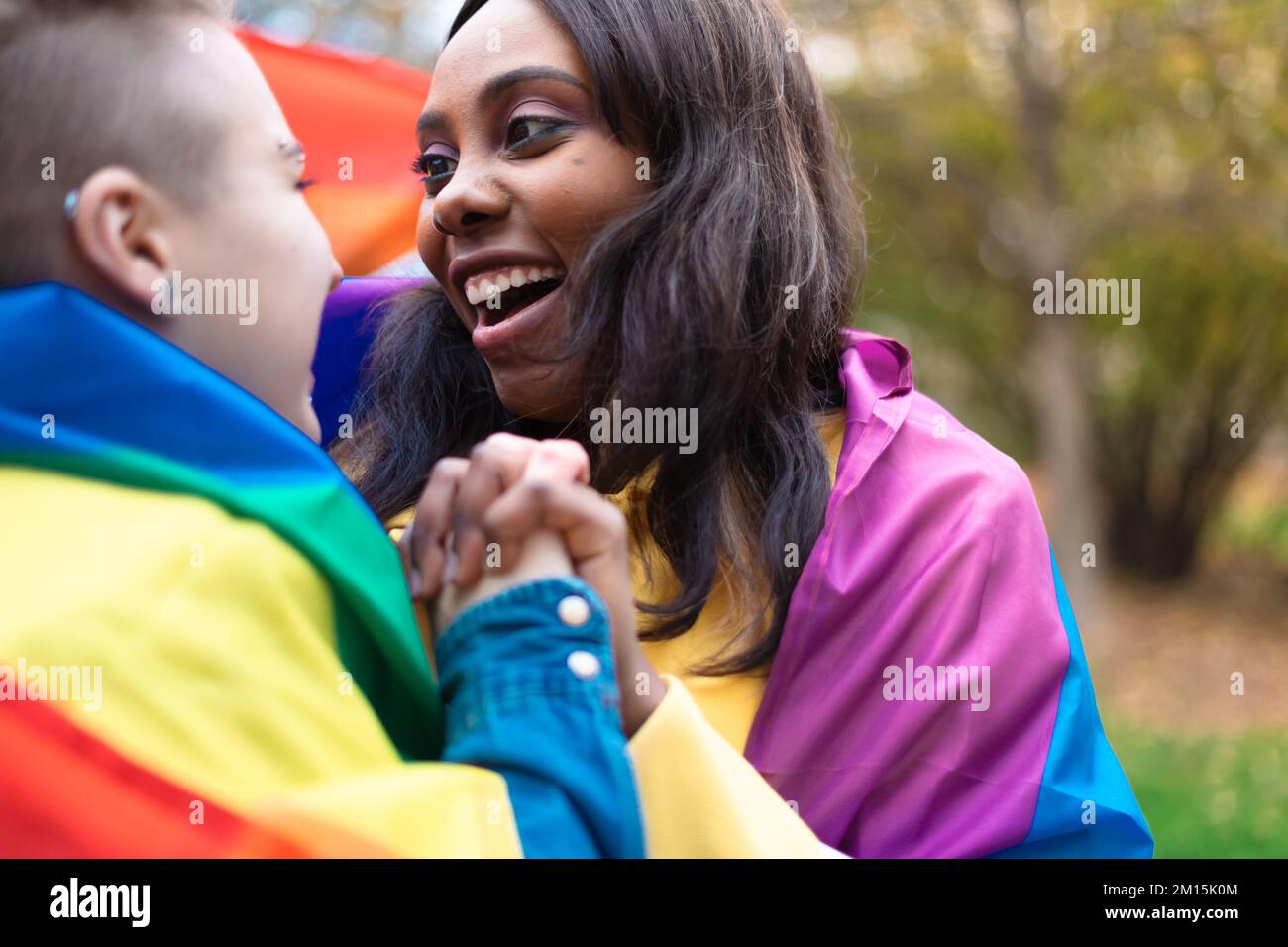 Portrait of girls during demonstration for lgbtq+ community and human rights - Expression of freedom and love concept Stock Photo