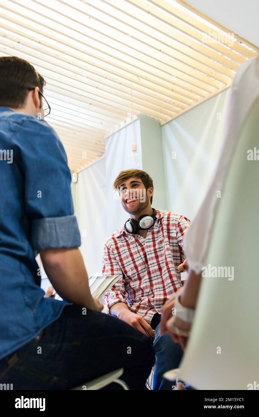 Two creative men working at office in casual clothes Stock Photo