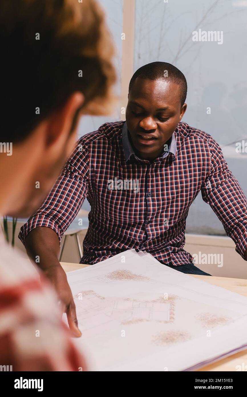 Two architects and engineers working at the Office Stock Photo