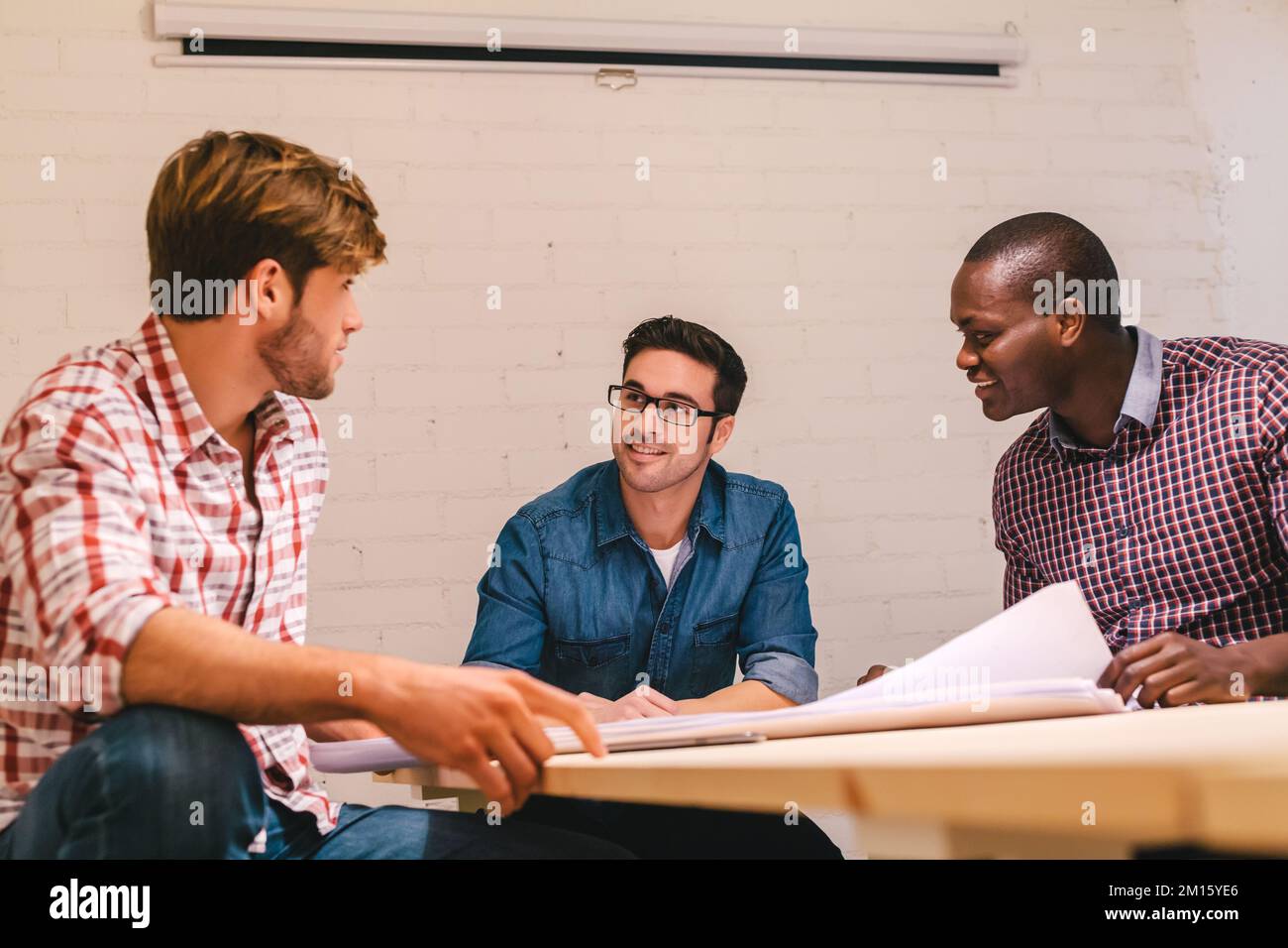 Architects and engineers working at the Creative Office Stock Photo