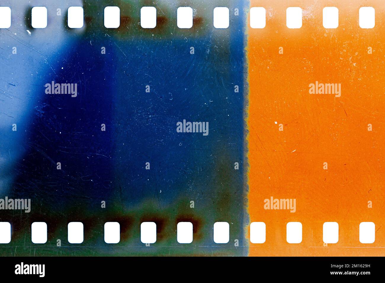 Dusty and grungy 35mm film texture or surface. Perforated scratched ...