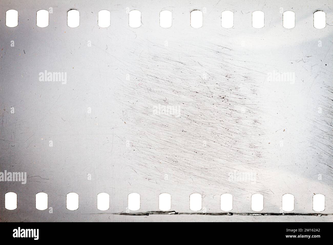Dusty and grungy 35mm film texture or surface. Perforated scratched ...