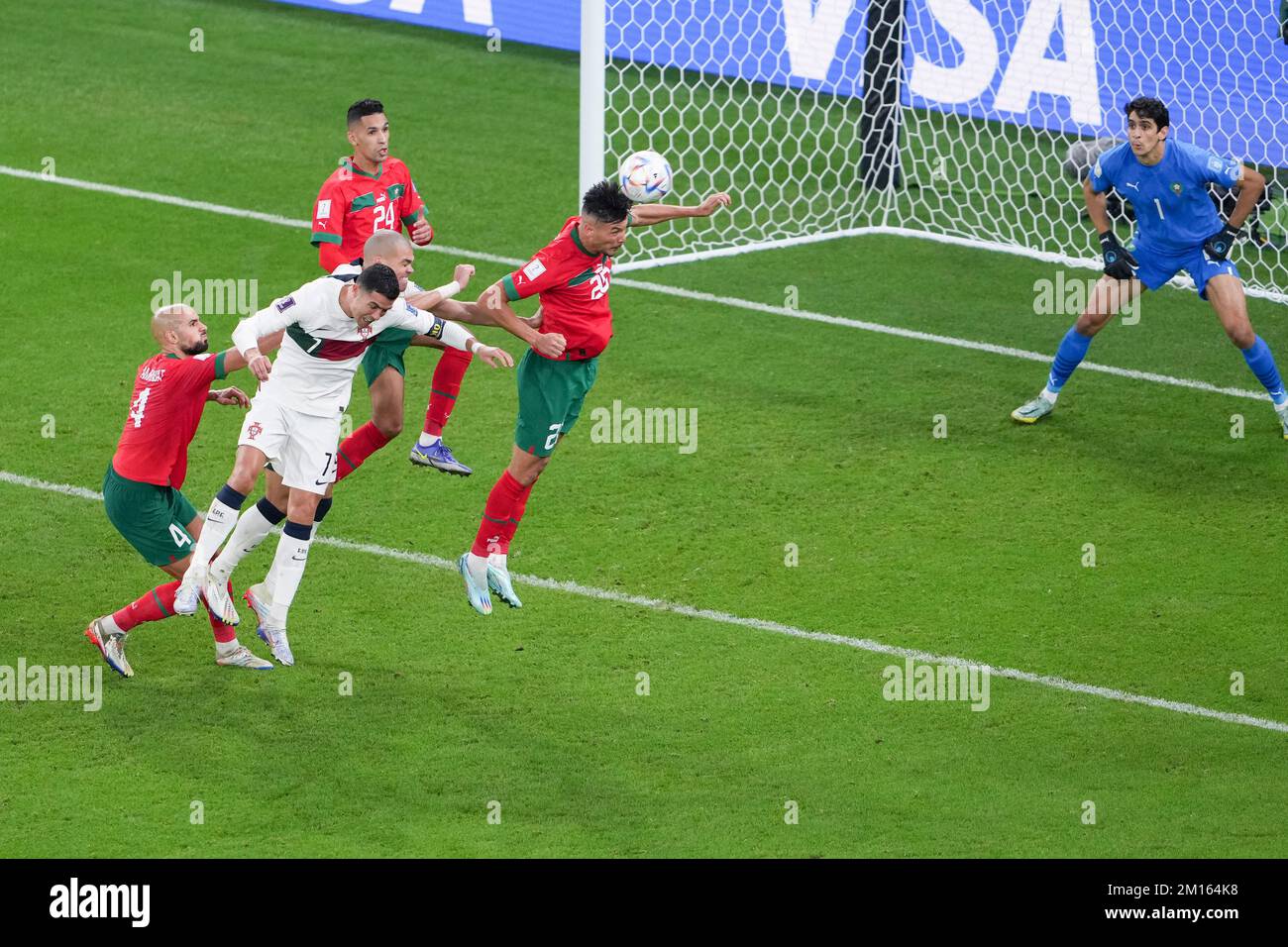 Doha, Qatar. 10th Dec, 2022. Portugal's Cristiano Ronaldo (2nd L) and Pepe (3rd L) vie a header with Morocco's Achraf Dari during their Quarterfinal of the 2022 FIFA World Cup at Al Thumama Stadium in Doha, Qatar, Dec. 10, 2022. Credit: Zheng Huansong/Xinhua/Alamy Live News Stock Photo