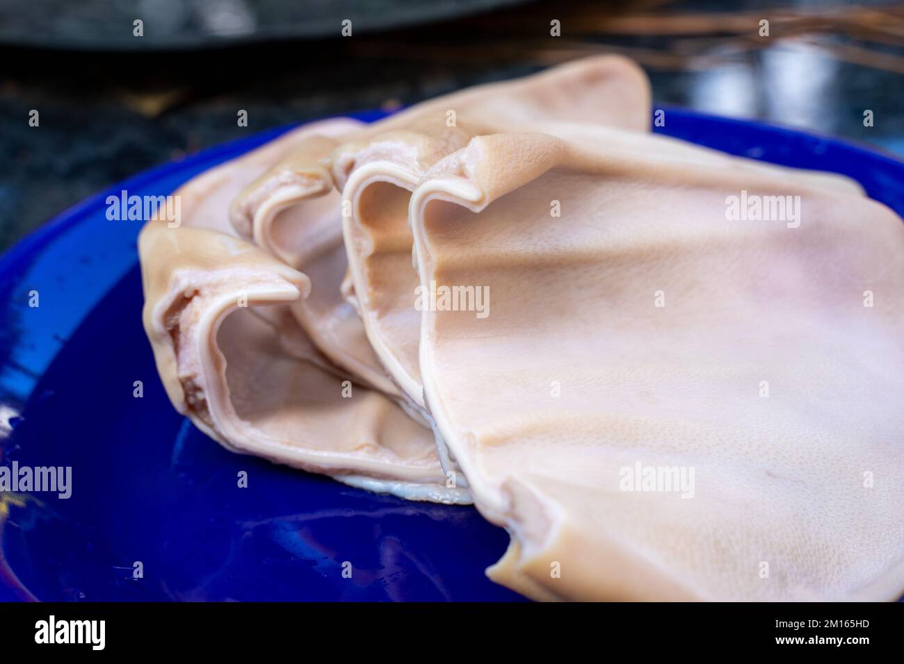Cooked pork ears. Vietnamese cuisine traditionally includes pork parts