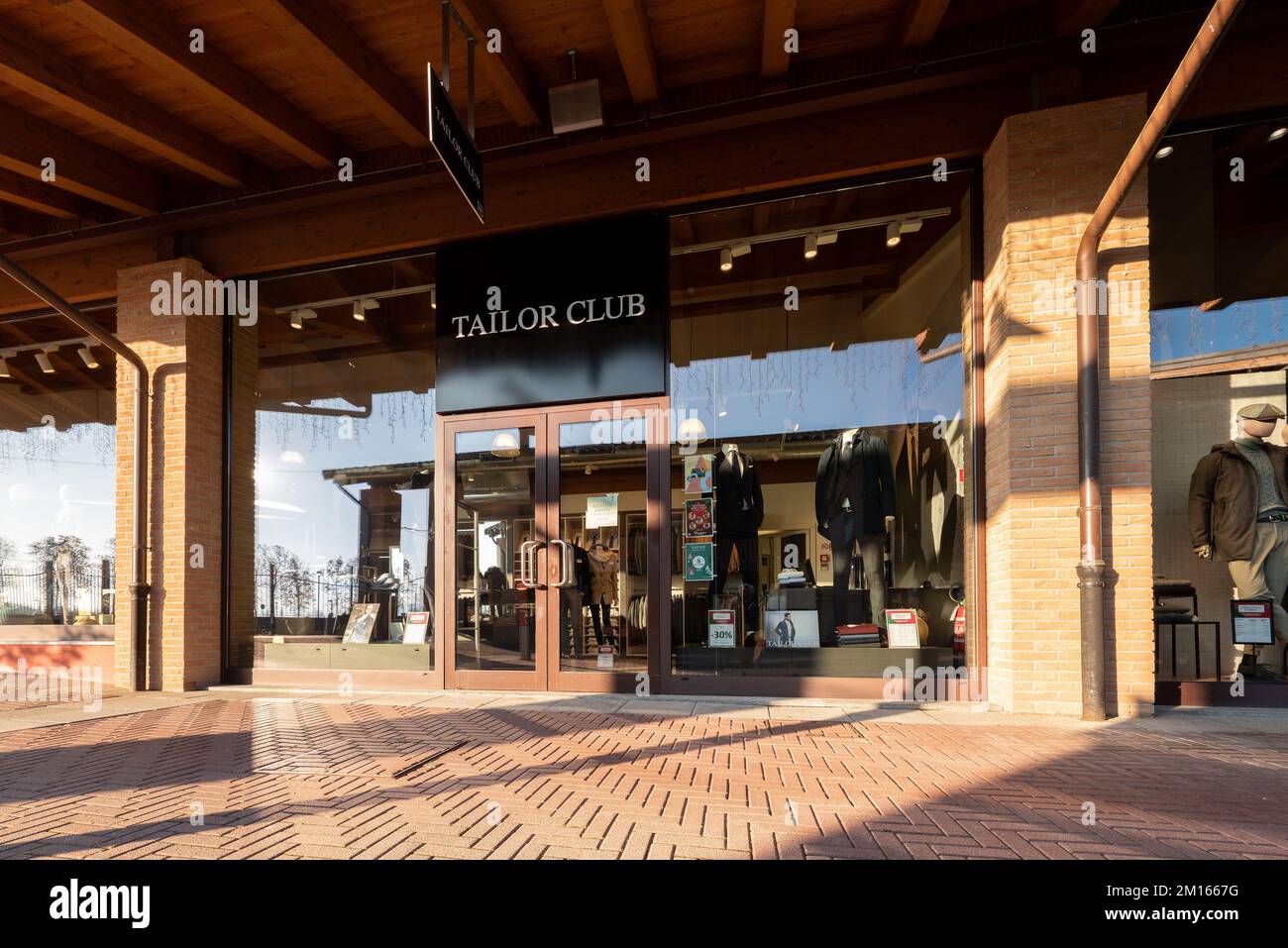 Mondovì, Cuneo, Italy - December 07, 2022: Tailor Club clothing shop, in Mondovicino Italian outlet village shopping mall, Tailor Club offers haute co Stock Photo