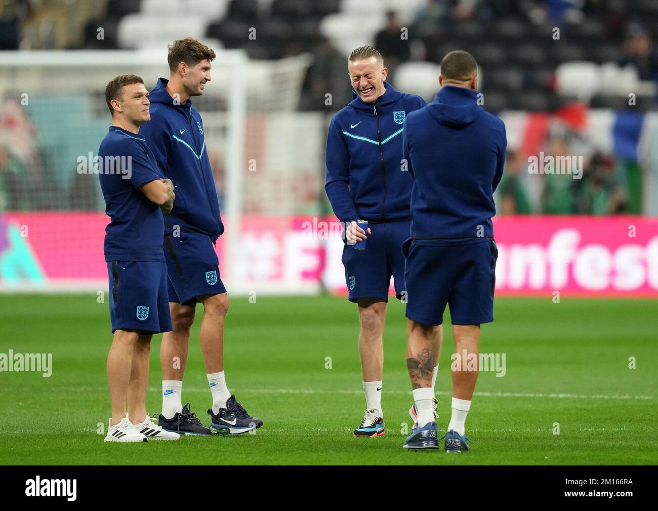Left to right, England's Kieran Trippier, John Stones, Jordan Pickford