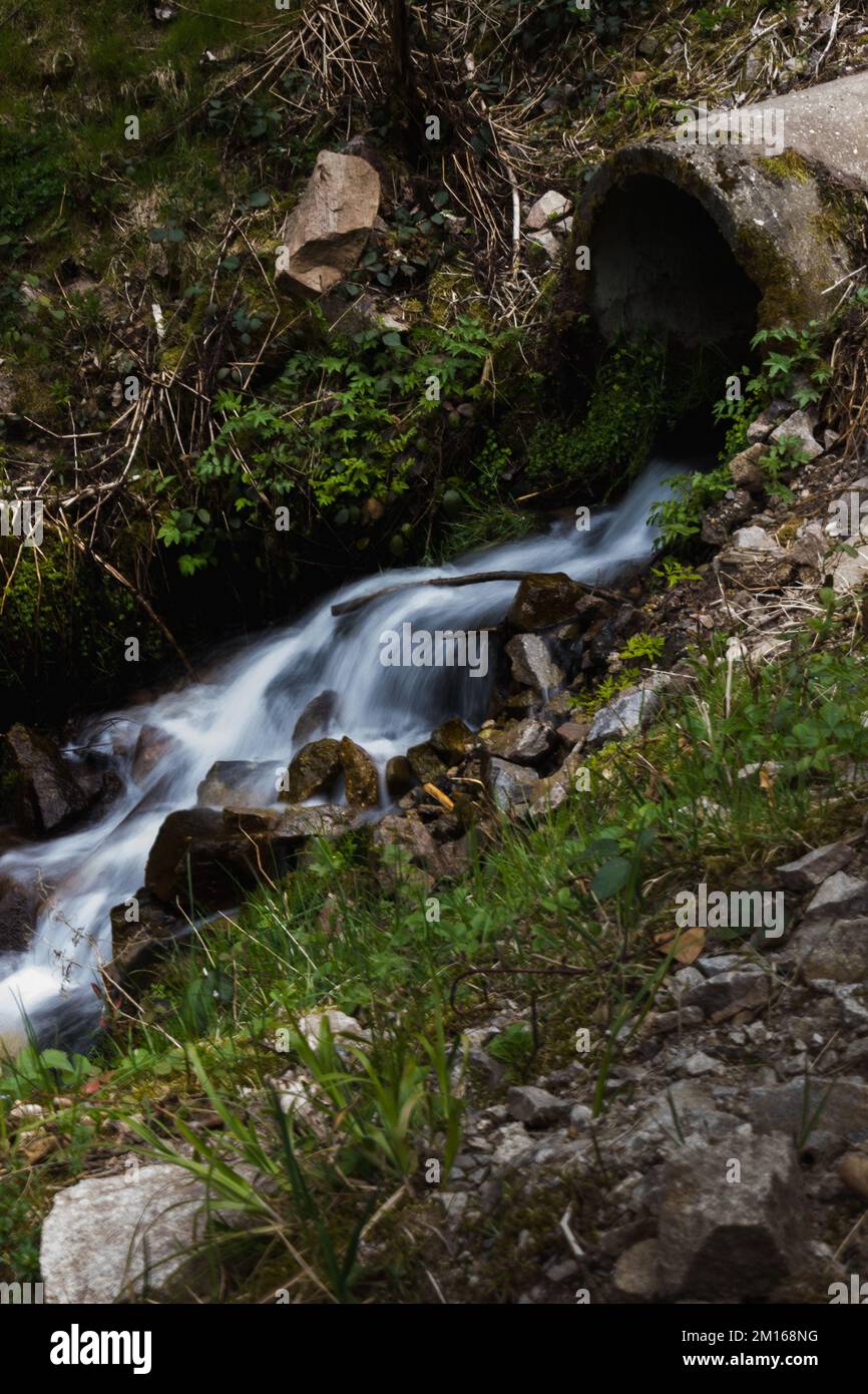 A beautiful landscape of a waterfall in forest Stock Photo - Alamy