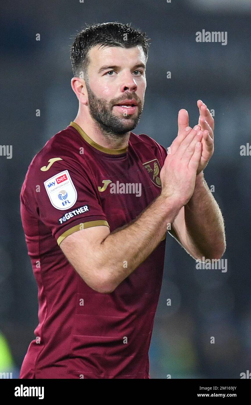 Grant Hanley #5 of Norwich City Applauds the travelling supporters during the Sky Bet Championship match Swansea City vs Norwich City at Swansea.com Stadium, Swansea, United Kingdom, 10th December 2022  (Photo by Mike Jones/News Images) Stock Photo