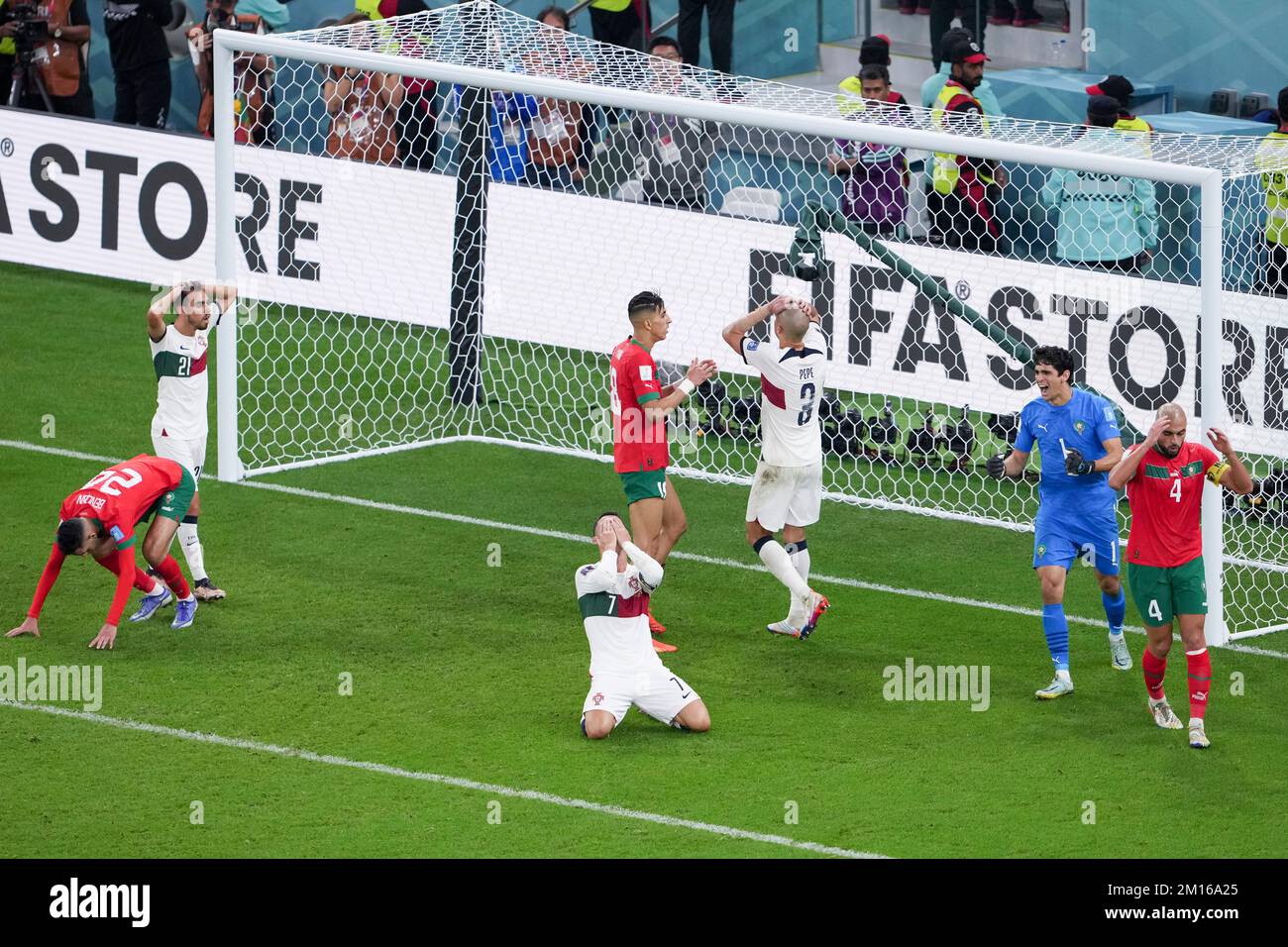 Doha, Qatar. 10th Dec, 2022. Cristiano Ronaldo (3rd L) and Pepe (3rd R) of Portugal react after missing a goal during the Quarterfinal between Morocco and Portugal of the 2022 FIFA World Cup at Al Thumama Stadium in Doha, Qatar, Dec. 10, 2022. Credit: Zheng Huansong/Xinhua/Alamy Live News Stock Photo