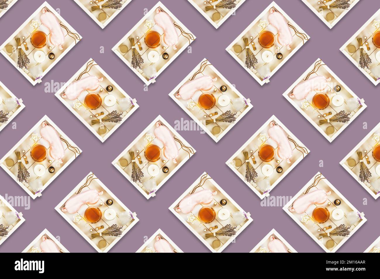 Sleep care seamless pattern. Relax at home background. Cup of herbal tea, aroma candle, sticks, lavender flowers, dry oranges and natural oils on wood Stock Photo
