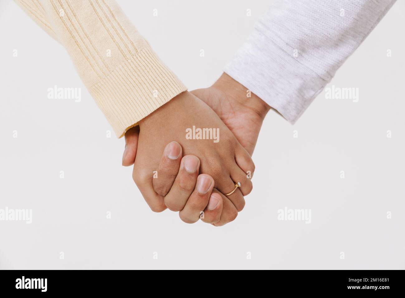 Indian couple holding hands hi-res stock photography and images - Alamy