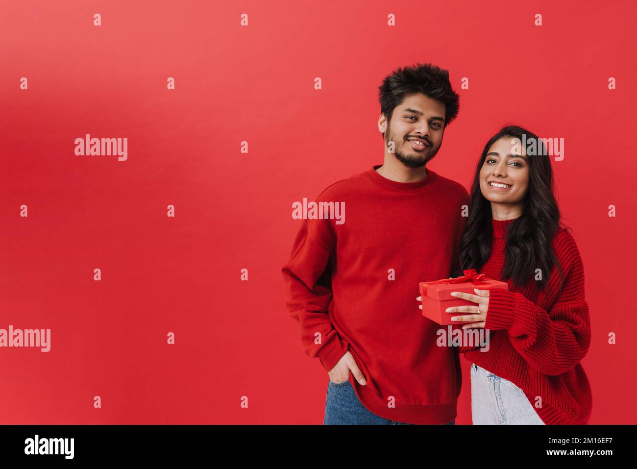 Young indian couple smiling hi-res stock photography and images - Alamy