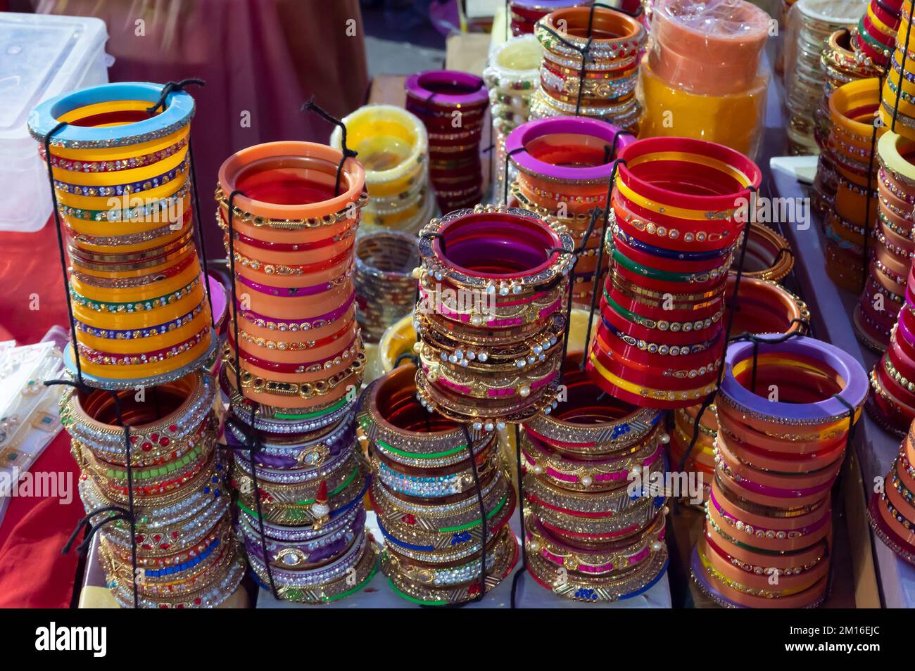 Beautiful Rajasthani Bangles being sold at famous Sardar Market and Ghanta ghar Clock tower in Jodhpur, Rajasthan, India. Stock Photo