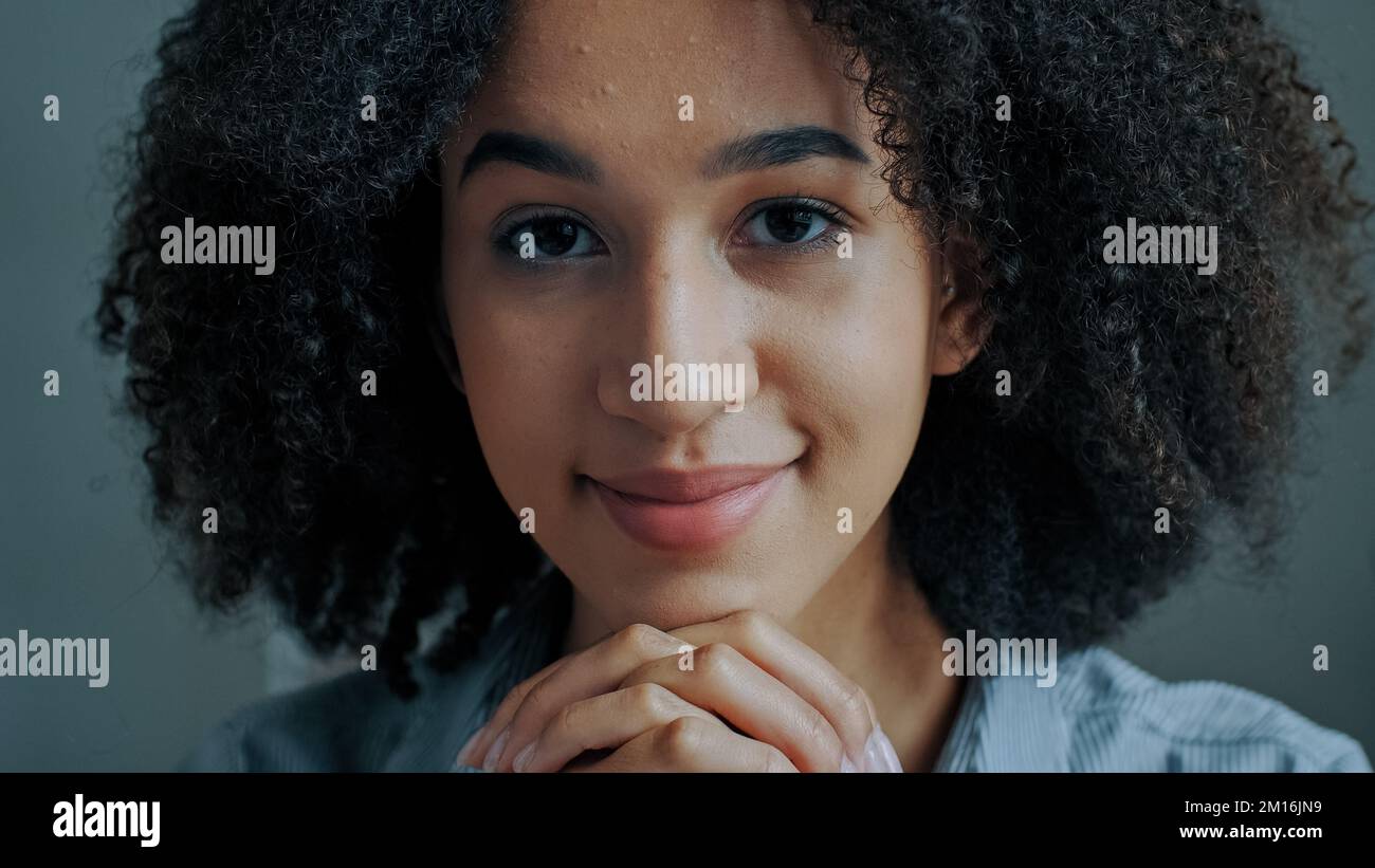 Cute ethnic african american woman curly girl 20s student freelancer