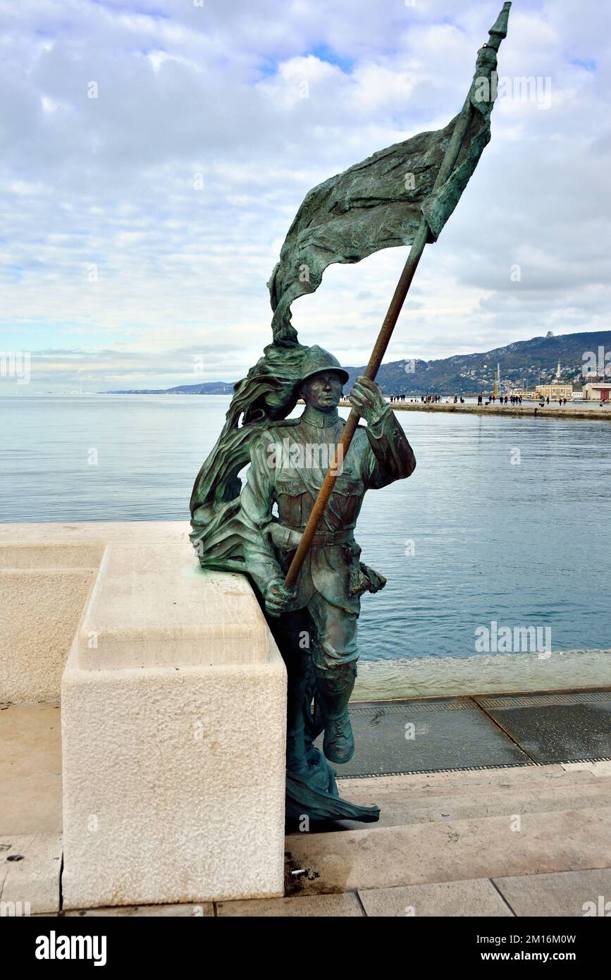 Trieste, Italy. The bronze statue of the WWI Bersagliere landing on the pier. Stock Photo