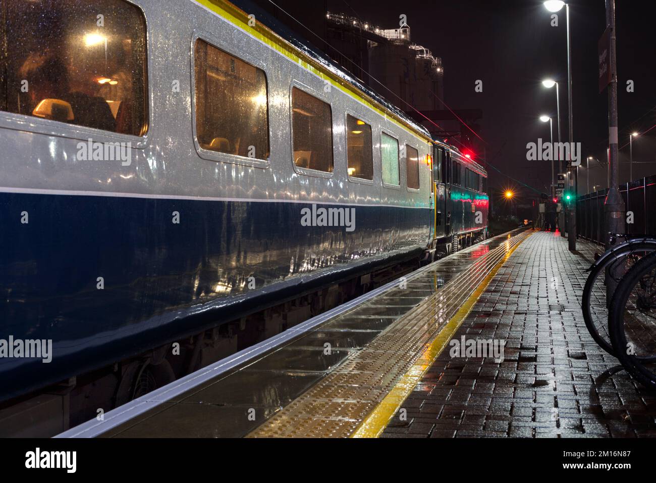 1970's British Rail blue and grey mk2 carriages with west coast Railways 86401 waiting at Warrington Bank Quay railway station Stock Photo