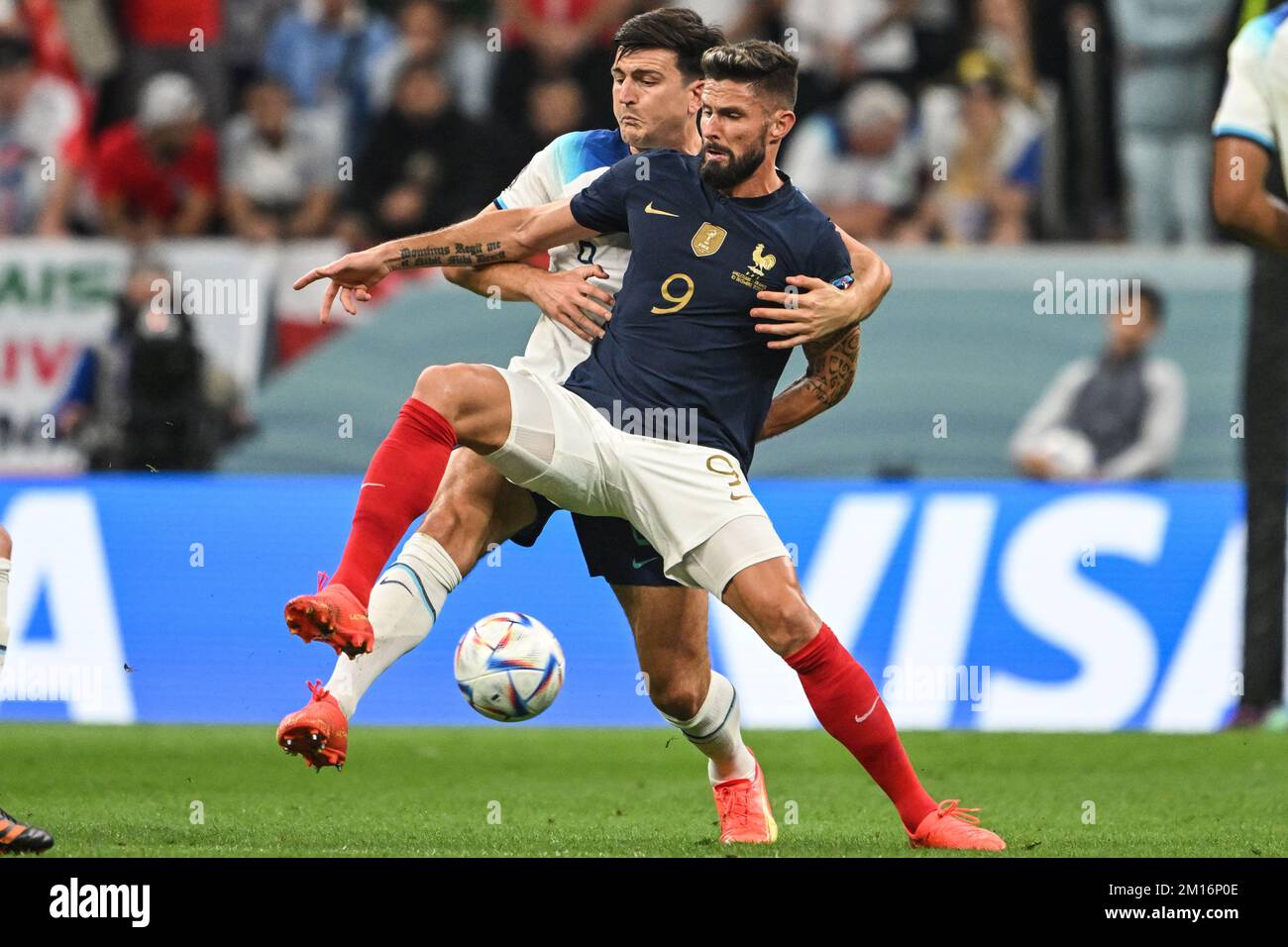 Al Chaur, Qatar. 10th Dec, 2022. Soccer, World Cup, England - France, final round, quarter-final, Al-Bait Stadium, England's Harry Maguire and France's Olivier Giroud in duel. Credit: Robert Michael/dpa/Alamy Live News Stock Photo