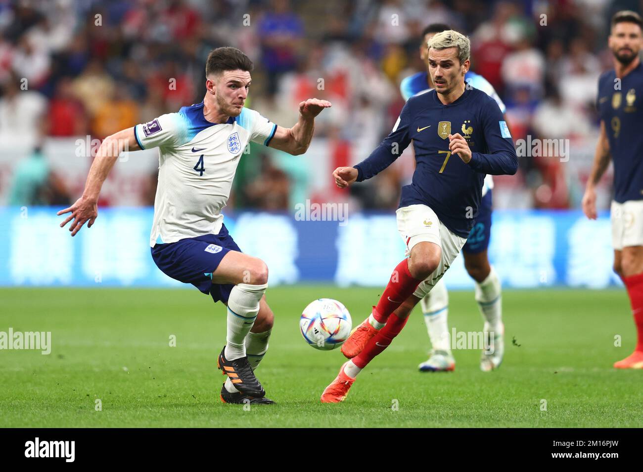 Al Khor, Qatar. 10th Dec, 2022. Declan Rice (L) of England in action with Antoine Griezmann of France during the 2022 FIFA World Cup Quarter-Final match at Al Bayt Stadium in Al Khor, Qatar on December 10, 2022. Photo by Chris Brunskill/UPI Credit: UPI/Alamy Live News Stock Photo