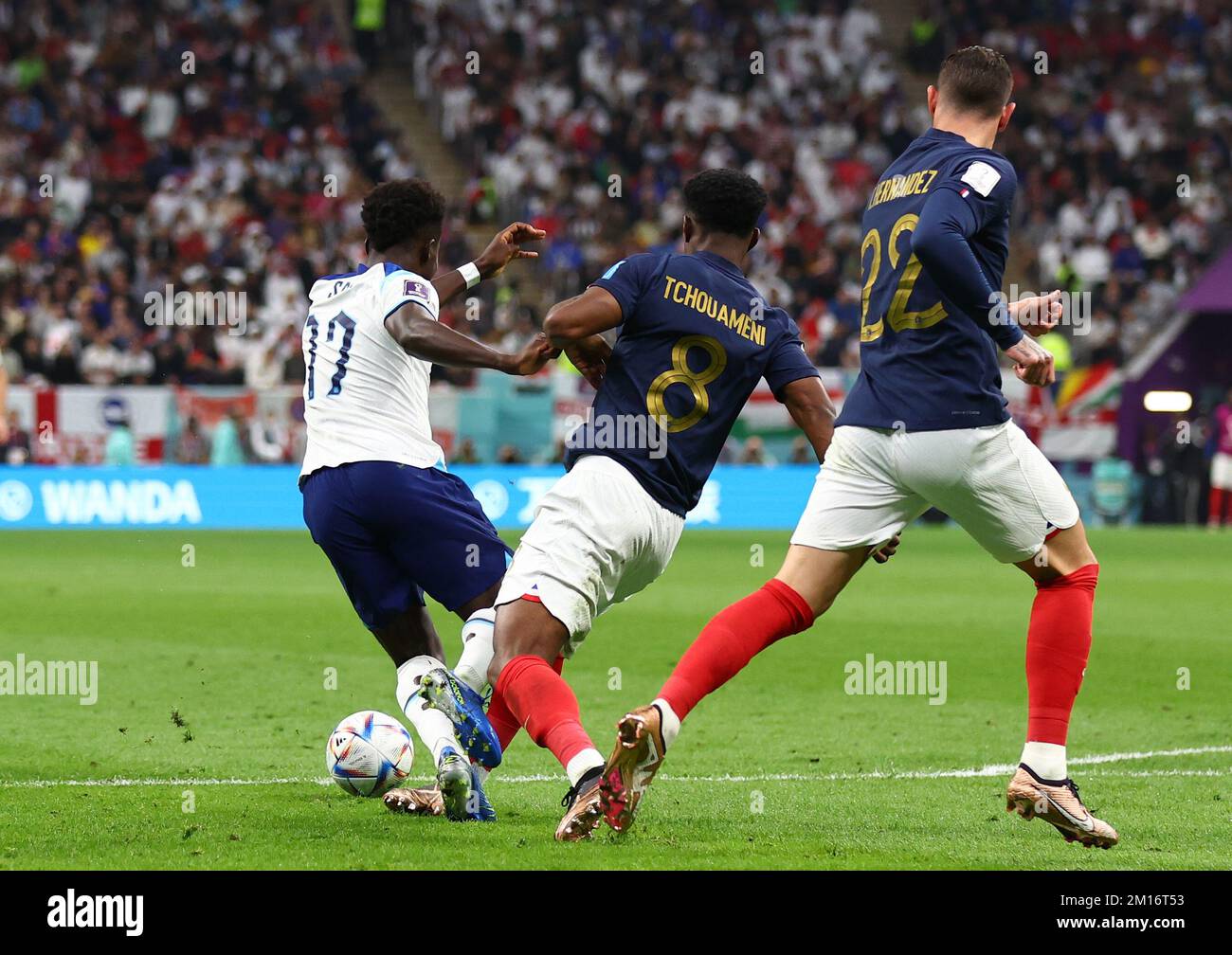 Al Khor, Qatar, 10th December 2022. Aurelien Tchouameni of France brings  down e17 to give away a penalty during the FIFA World Cup 2022 match at Al  Bayt Stadium, Al Khor. Picture