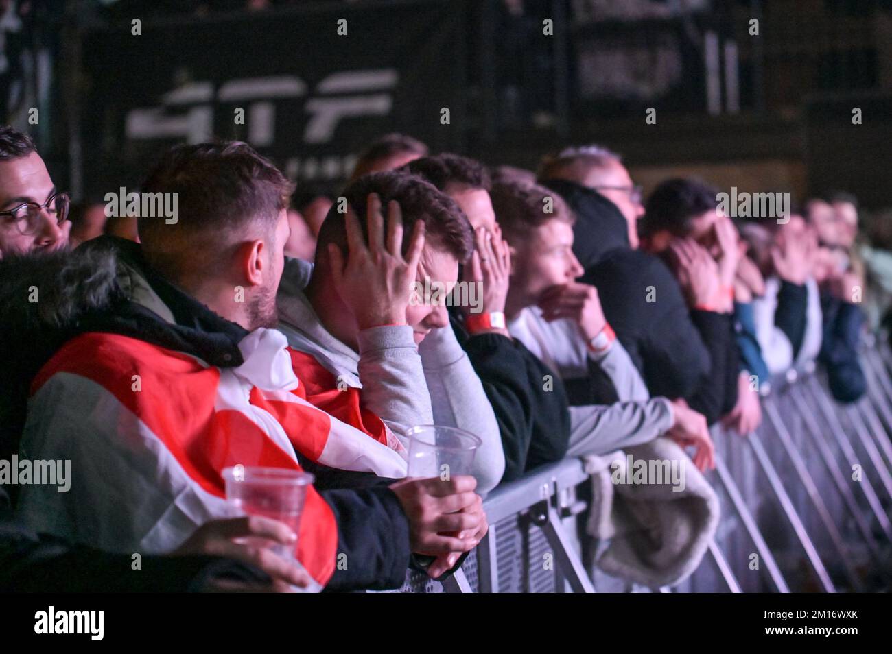 The Mill, Digbeth, Birmingham, December 10th 2022 - England fans react at the 4TheFans Fan Park in Birmingham after France score their second goal against England in the 2022 FIFA World Cup. Credit: Sam Holiday/Alamy Live News Stock Photo