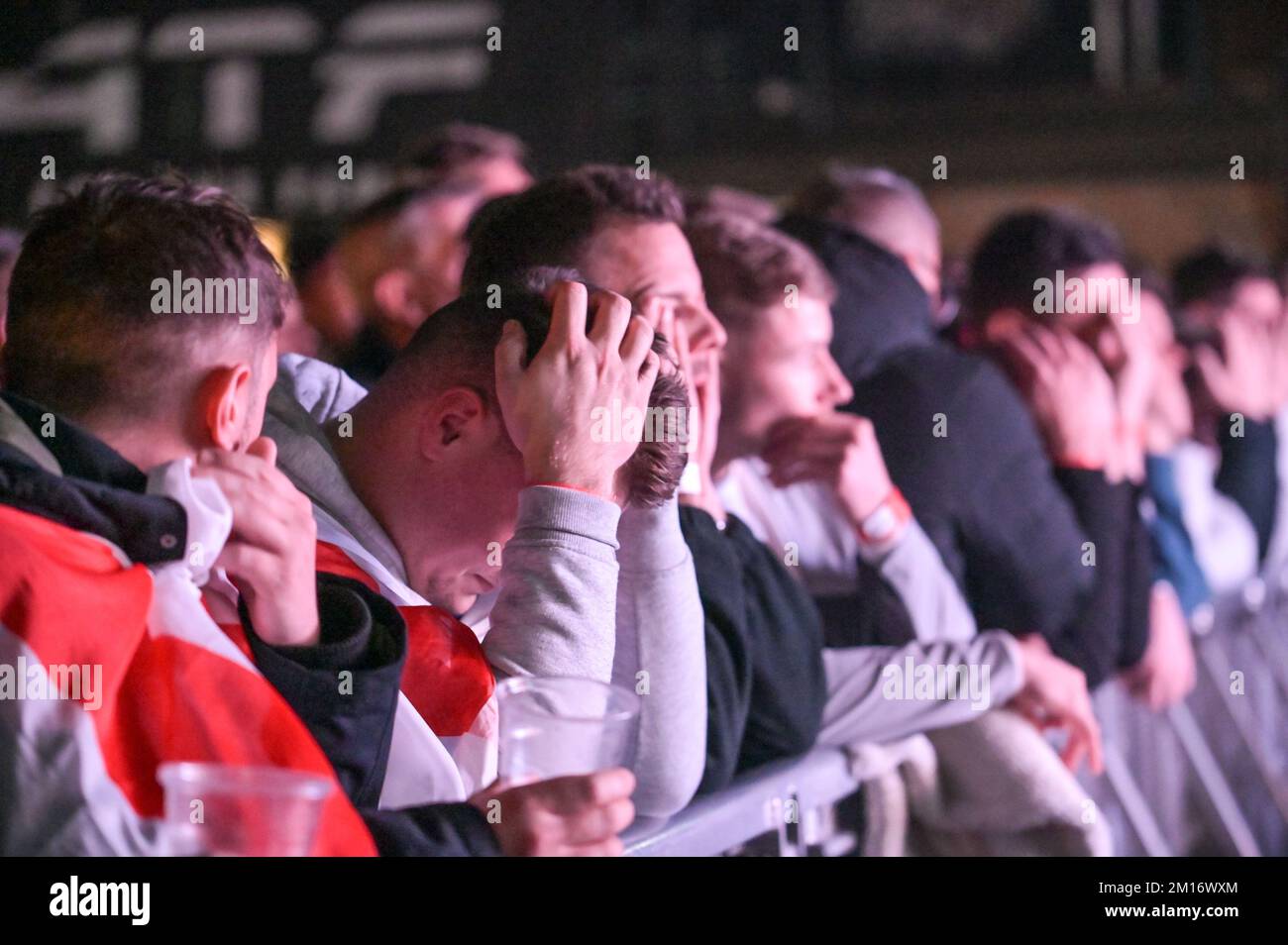 The Mill, Digbeth, Birmingham, December 10th 2022 - England fans react at the 4TheFans Fan Park in Birmingham after France score their second goal against England in the 2022 FIFA World Cup. Credit: Sam Holiday/Alamy Live News Stock Photo
