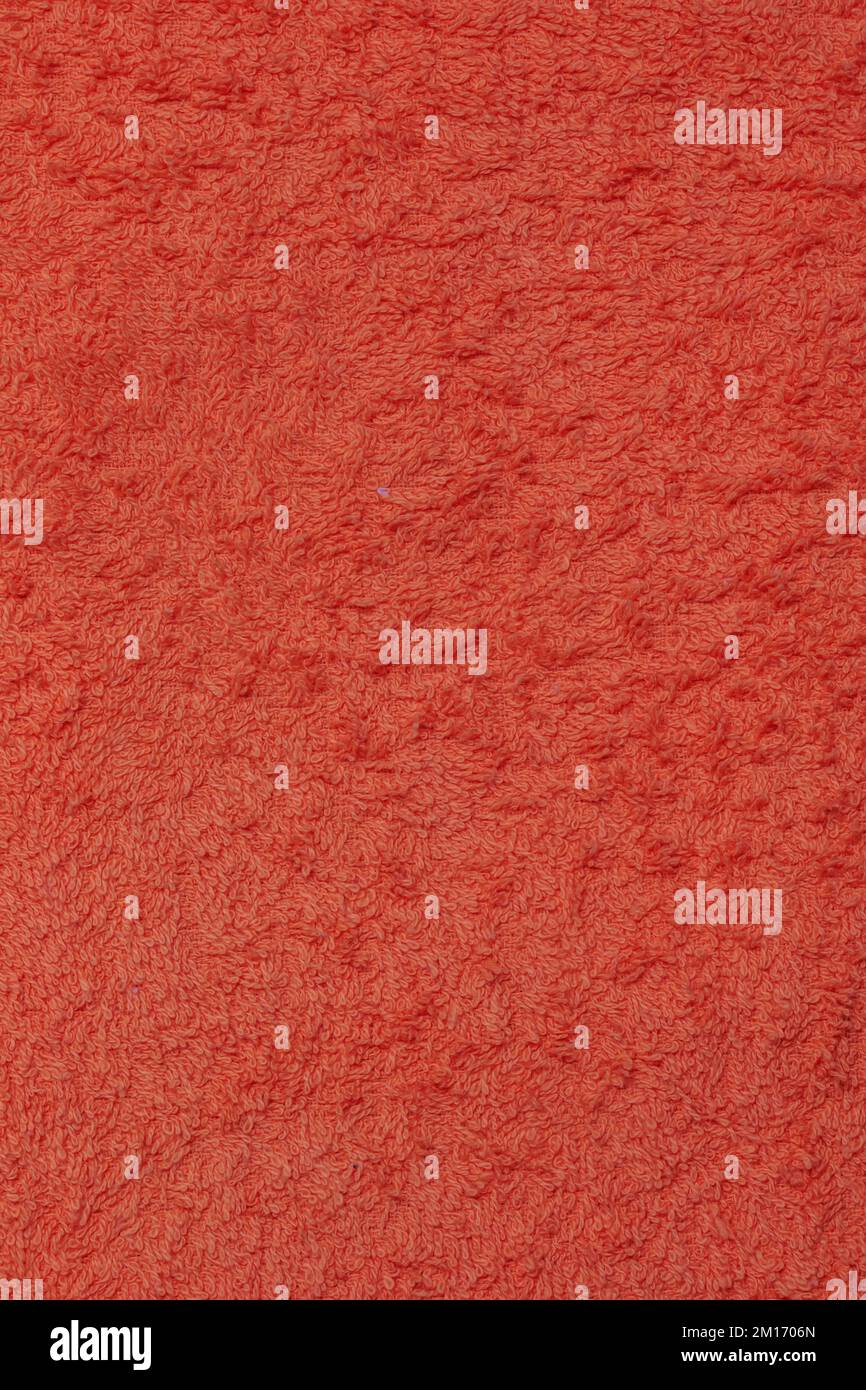 Orange terry towel background. Terry cloth texture Stock Photo