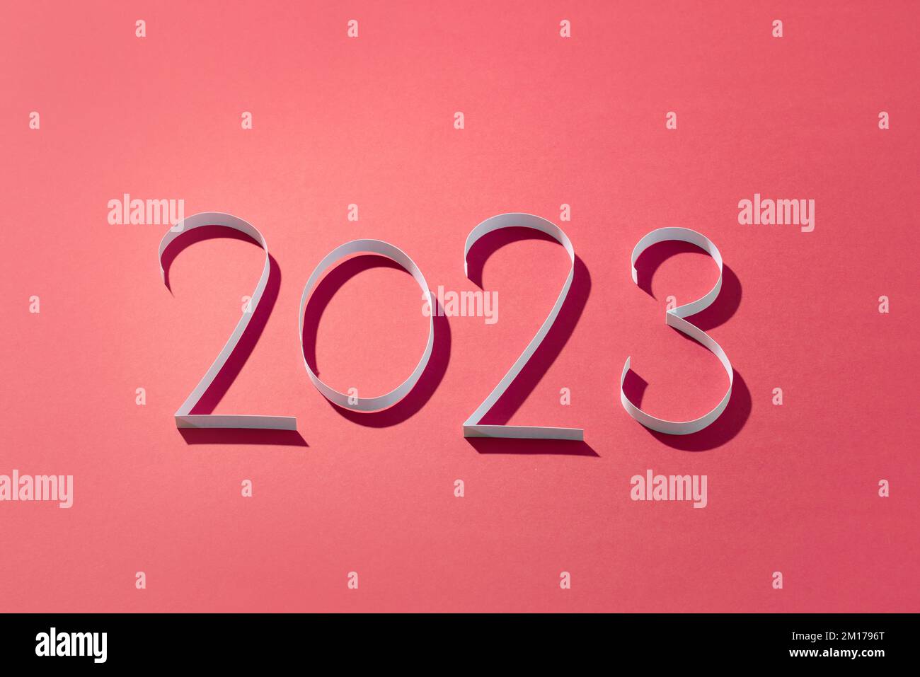 paper numbers two zero two three on red background Stock Photo - Alamy