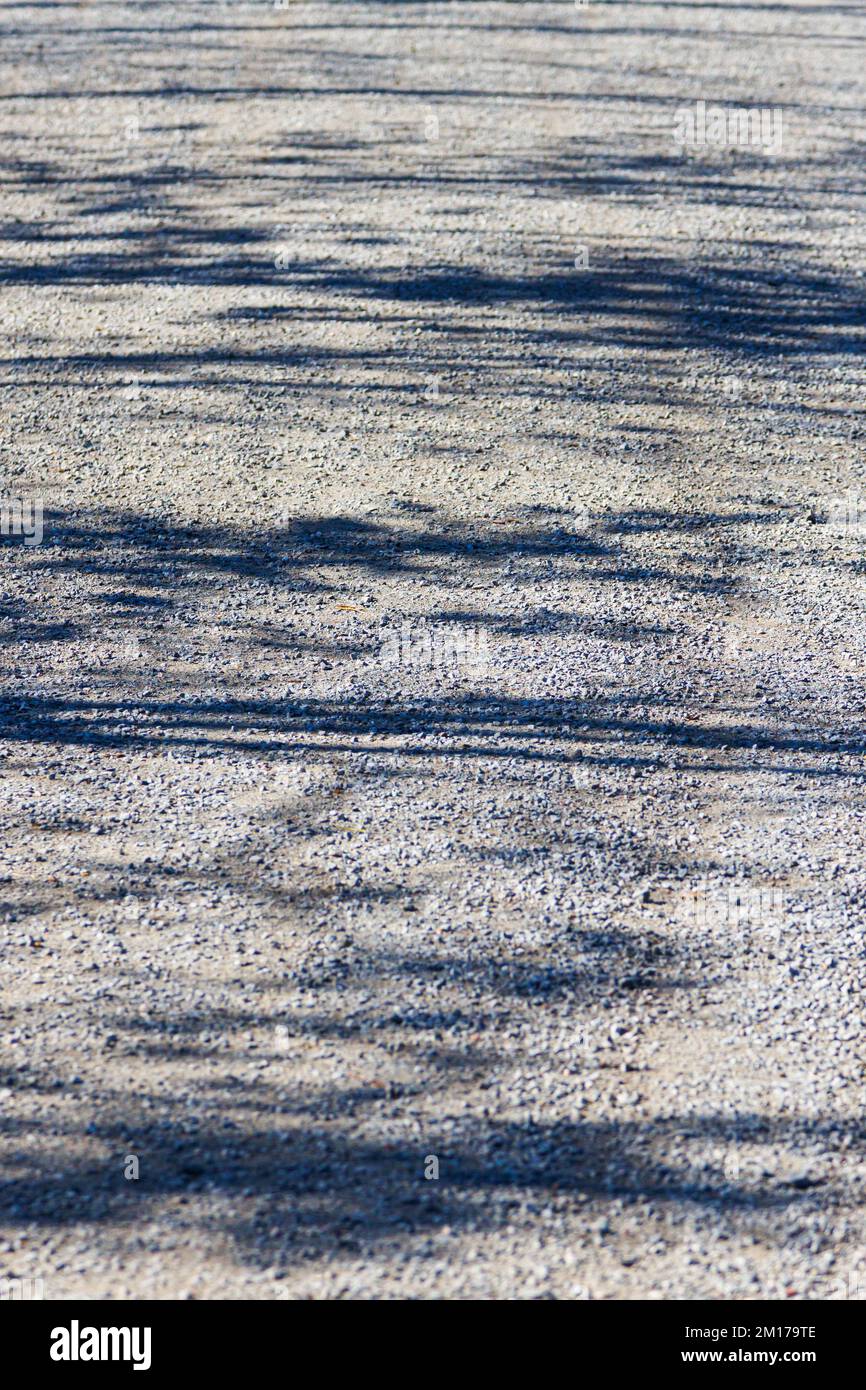 Fine gray gravel with shadows for your background. Excellent texture for fond. Stock Photo