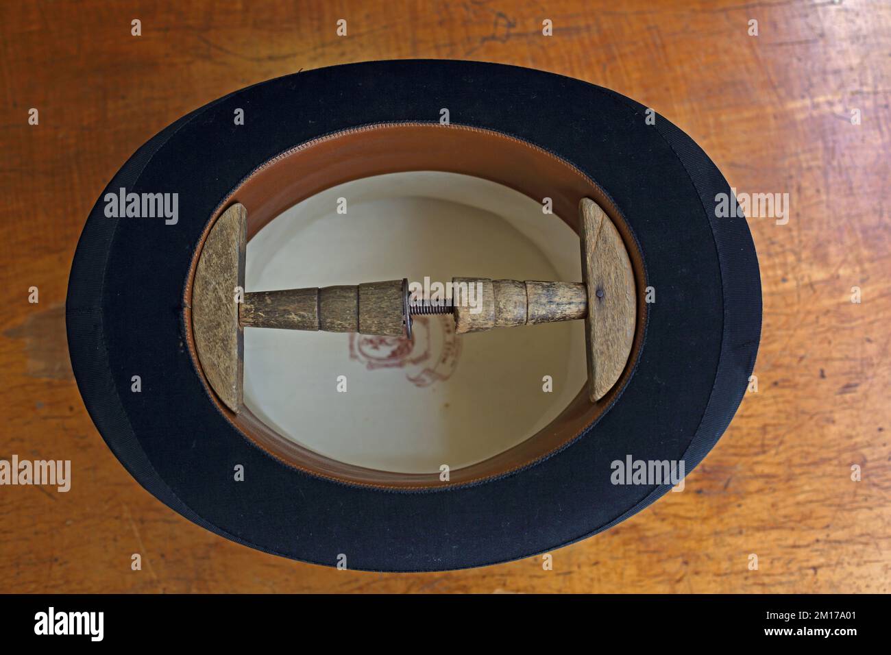 Hat stretcher and silk Top Hat at Lock & Co hatters Stock Photo - Alamy