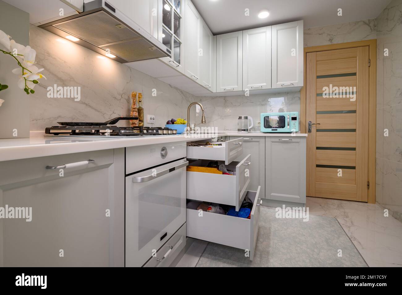 White and grey new modern well designed kitchen interior Stock Photo ...