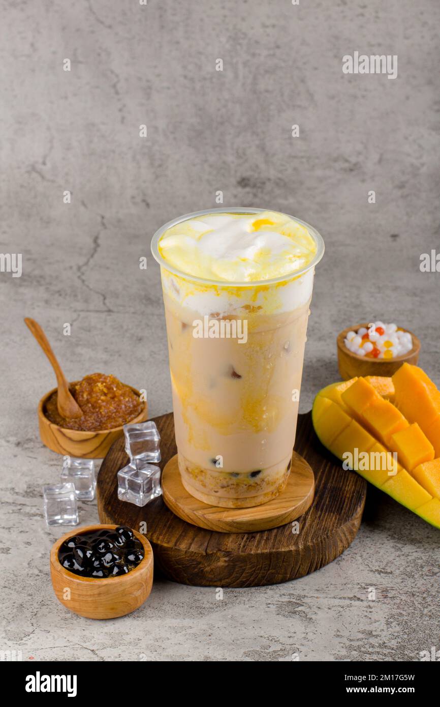 Boba or tapioca pearls is taiwan bubble milk tea in plastic cup with ...