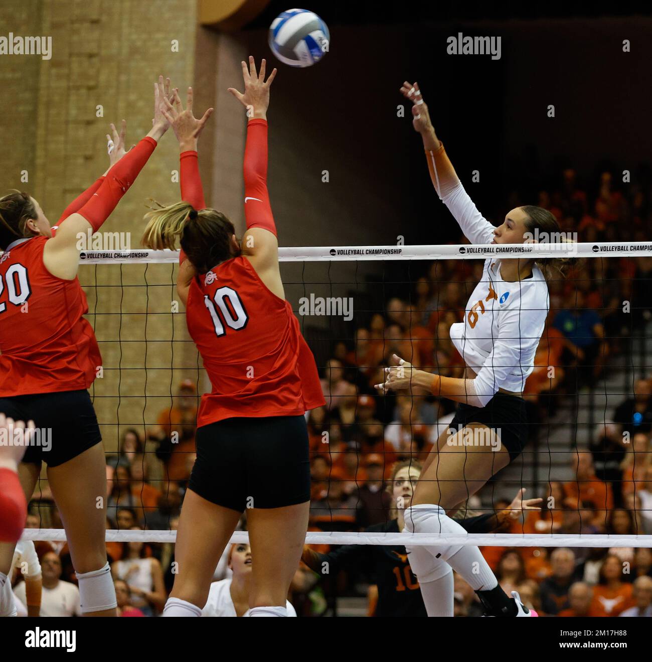 December 10, 2022 Texas outside hitter MADISEN SKINNER (6) at the net against Ohio State middle blocker Rylee Rader (20) and setter Mac Podraza (10) during the NCAA Womens Volleyball Tournament regional