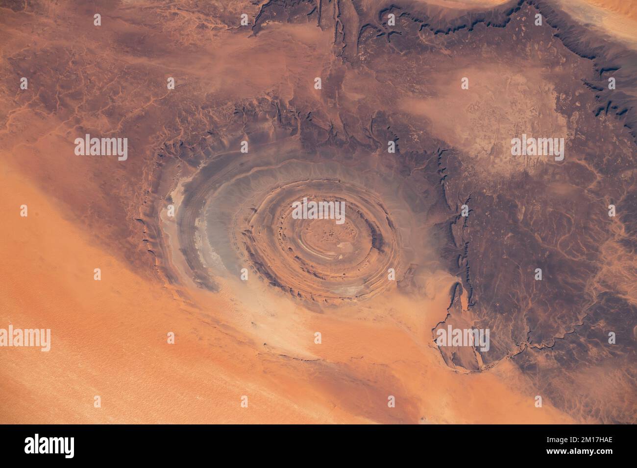 Aerial view of Richat Structure in Mauritania. Also Guelb er Richât in Arabic Qalb ar-Rīšāt.  Digitally enhanced. Elements of image furnished by NASA Stock Photo