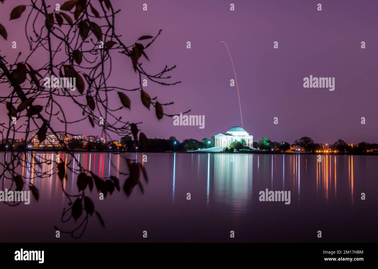 Long exposure of Antares rocket seen launch into space above Thomas Jefferson Memorial. Digitally enhanced. Elements of this image furnished by NASA Stock Photo