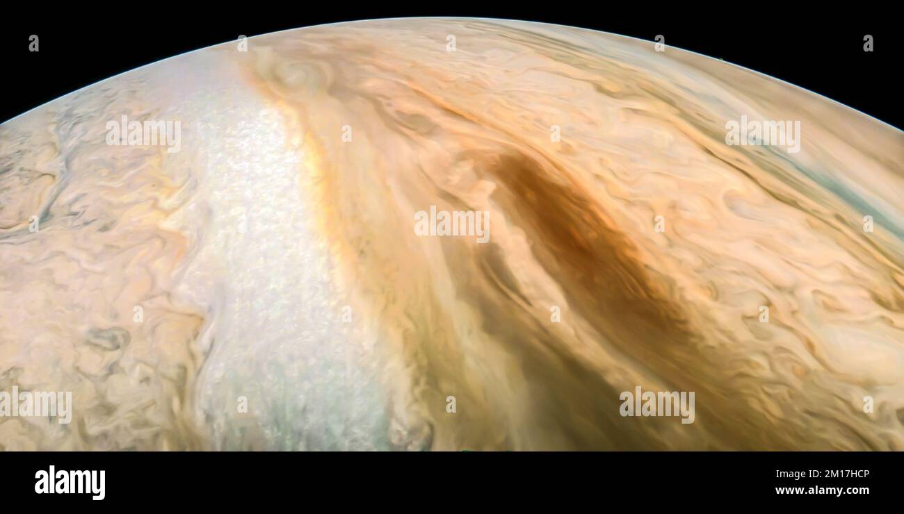 A brown oval also called brown barge from Jupiter's Equatorial Belt as seen from outer space. Digitally enhanced. Elements of this image furnished by NASA. Stock Photo