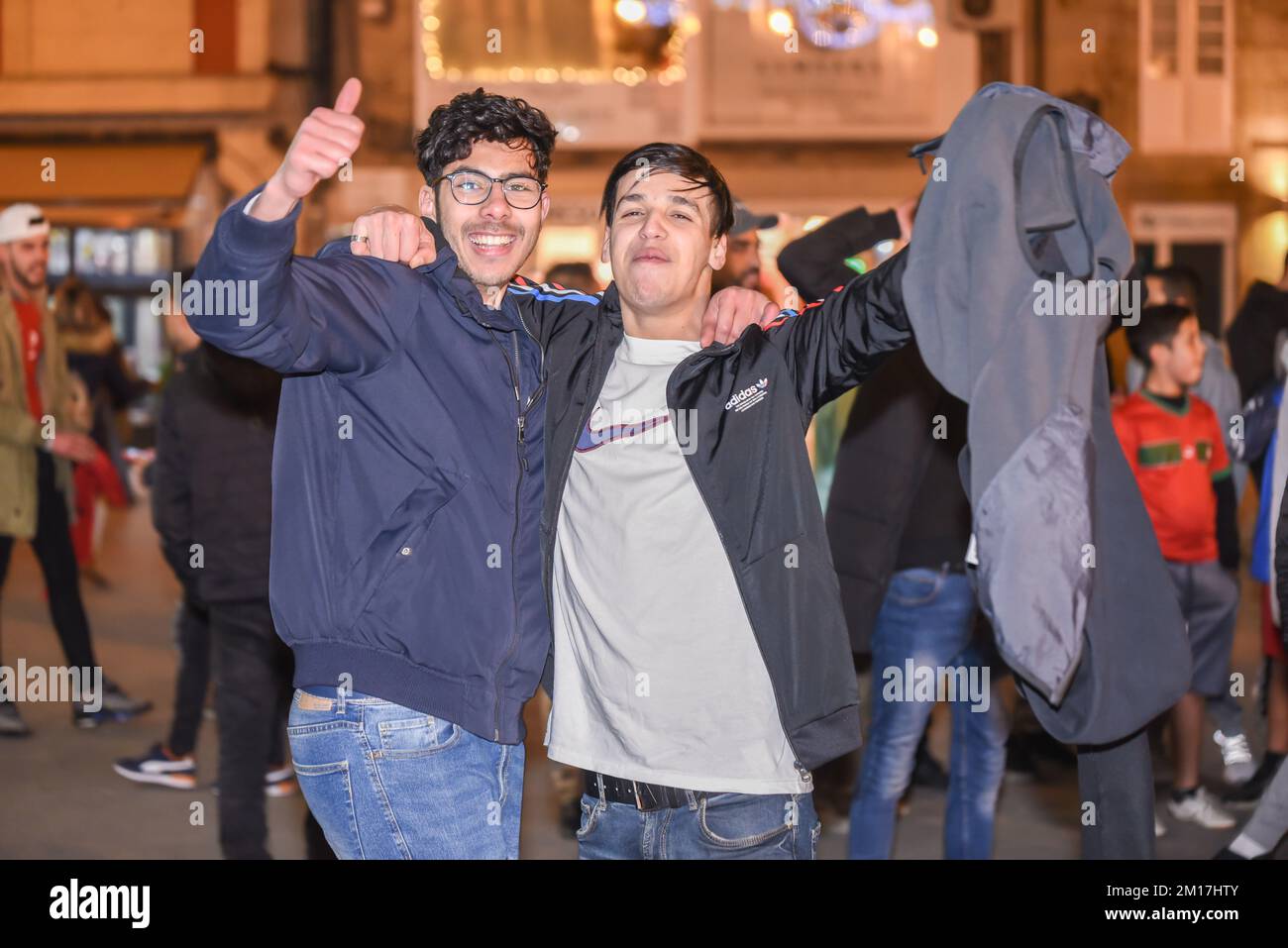 the moroccan people celebrate their victory in the world cup all over spain, in the picture a crowd of people celebrating in the main square of lugo t Stock Photo