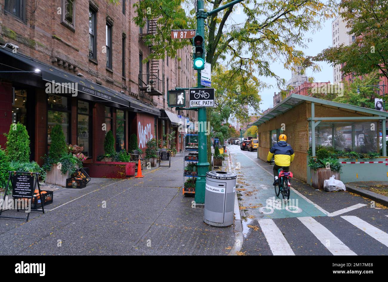 New York, NY - October 2022:  There is a separated bike lane on Columbus Avenue that goes from the upper west side all the way downtown Stock Photo