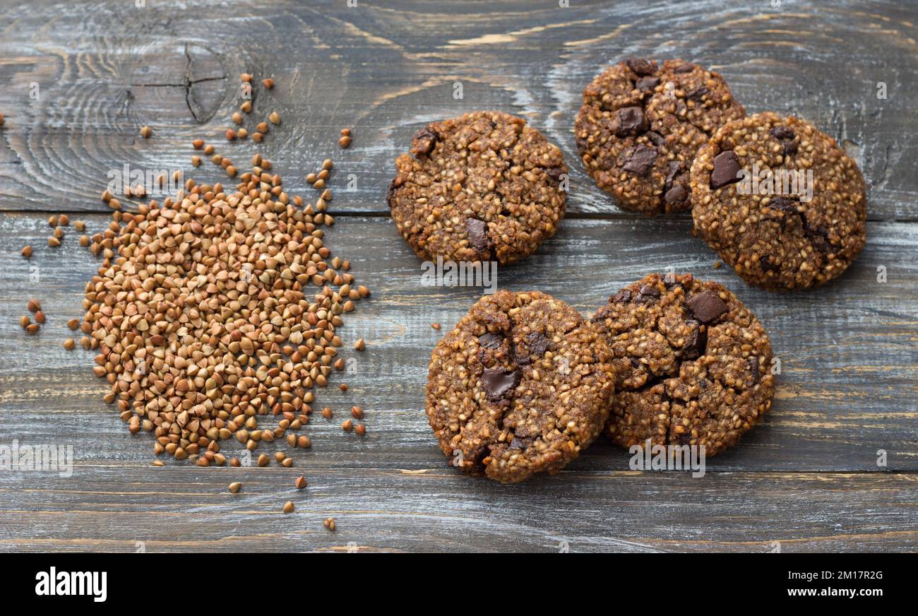 Healthy gluten-free buckwheat cookies with chocolate on a wooden table Stock Photo