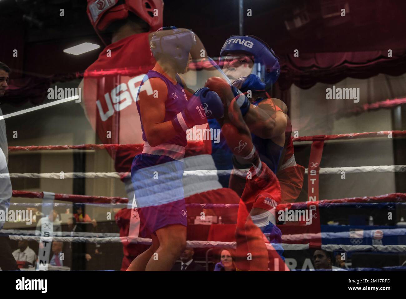Lubbock, TX, USA. 10th Dec, 2022. Double exposure of the action between Stephanie Simon of Miami FL, and Stacia Suttles of Philadelphia, PA in their Elite Female 146lb championship bout. Simon was declared the winner by decision. (Credit Image: © Adam DelGiudice/ZUMA Press Wire) Credit: ZUMA Press, Inc./Alamy Live News Stock Photo