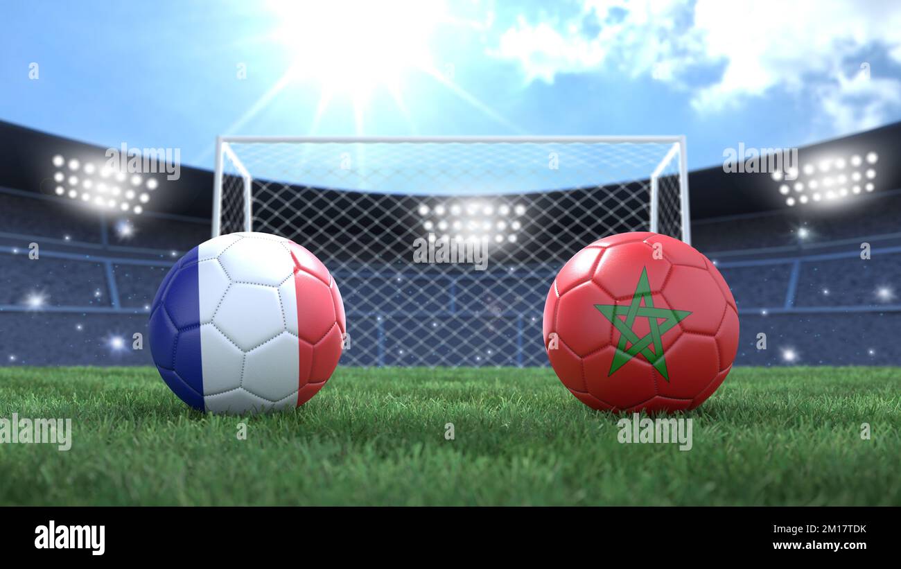Two soccer balls in flags colors on stadium blurred background. France