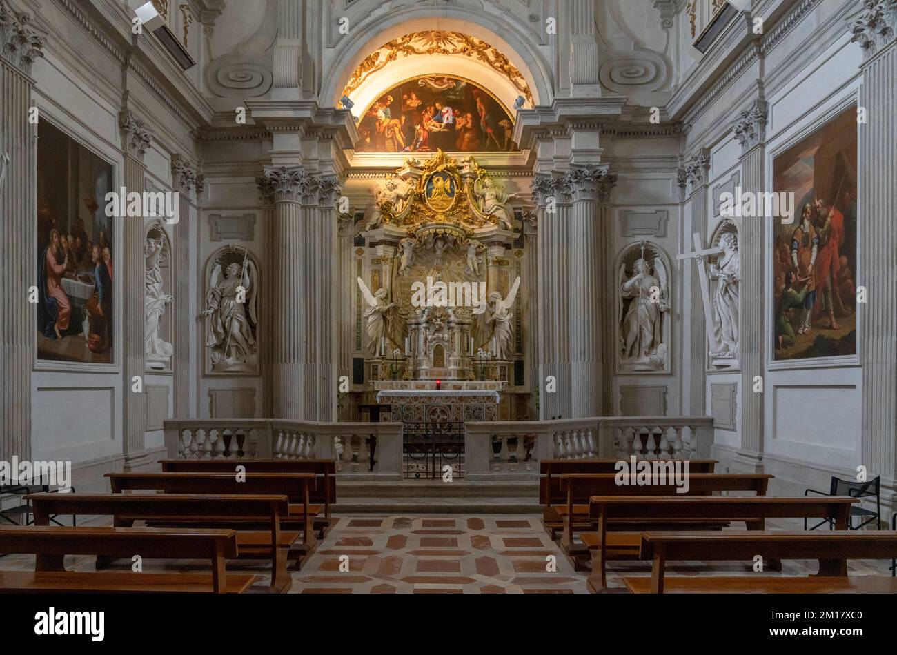 Spoleto, Italy - 25 November, 2022: altar and pews with statues and paintings inside the Spoleto Cathedral Stock Photo