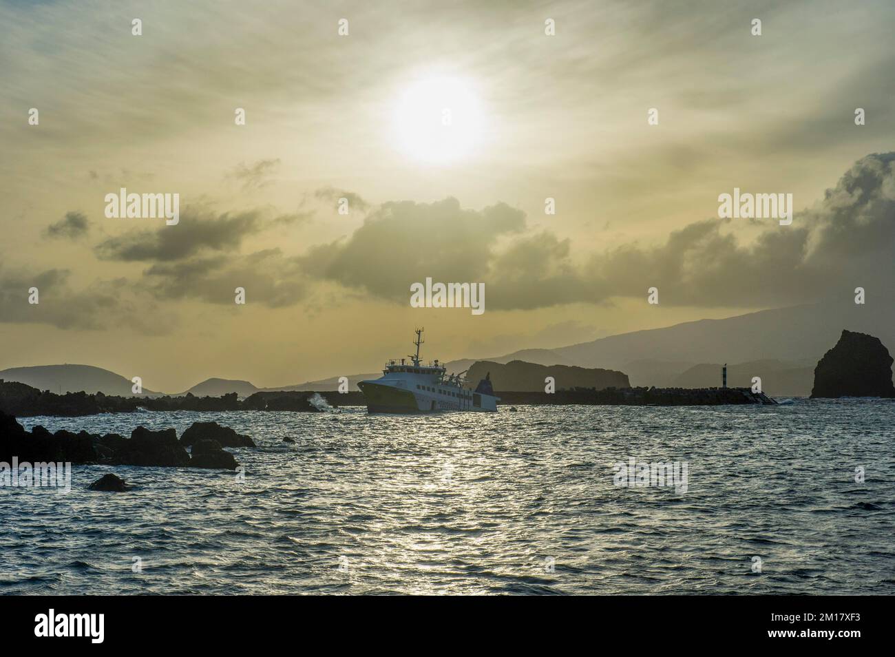Backlight of the harbour of Madalena, Island of Pico, Azores, Portugal, Europe Stock Photo