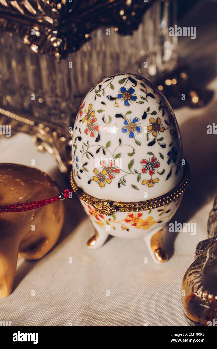 Decorated egg shaped ceramic container in the view Stock Photo